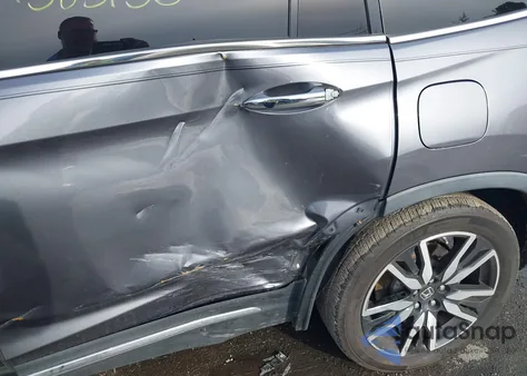 2019 Honda Pilot Touring z USA, uszkodzony, nr VIN 5FNYF5H99KB033617